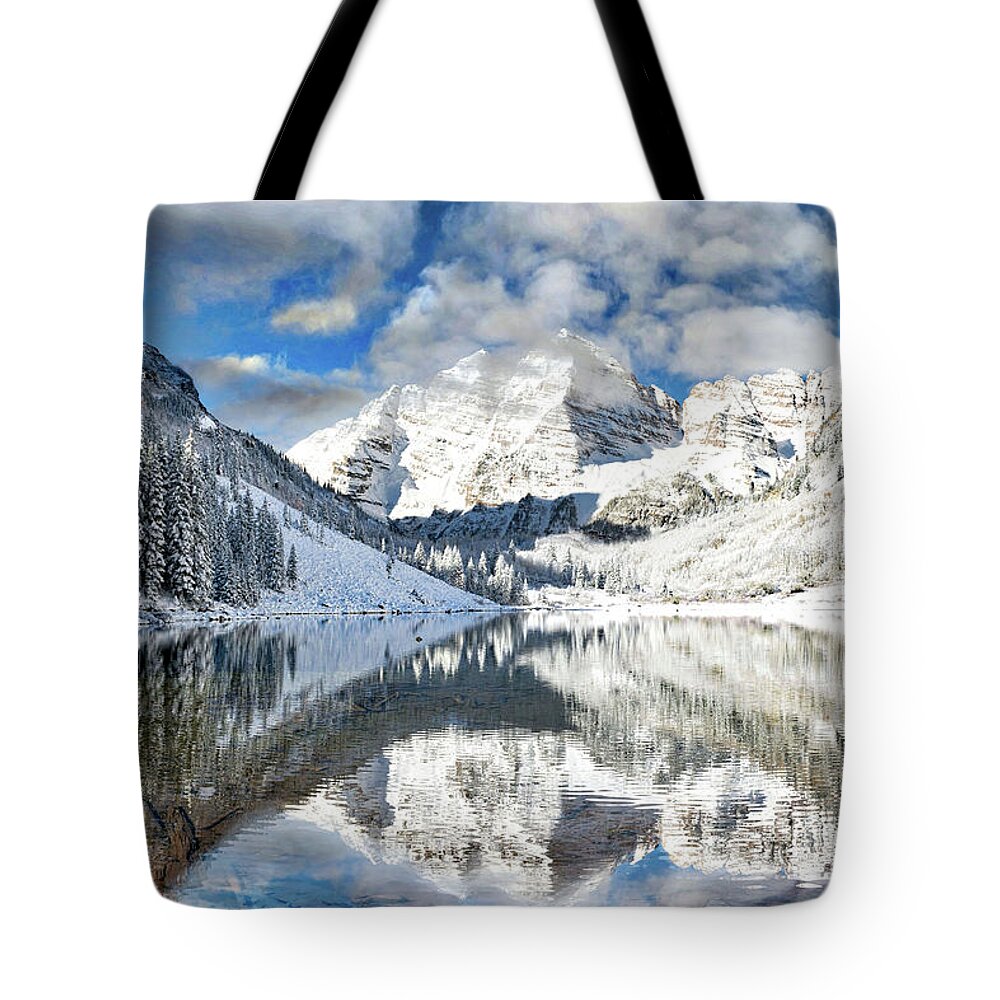 Colorado Tote Bag featuring the photograph Snow covered Maroon Bells in Aspen, Colorado. by OLena Art