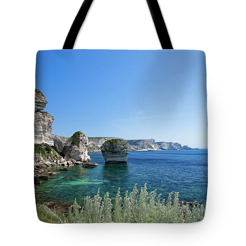 Bay Tote Bag featuring the photograph Mediterranean sea in front of the Bonifacio Cliff by Jean-Luc Farges