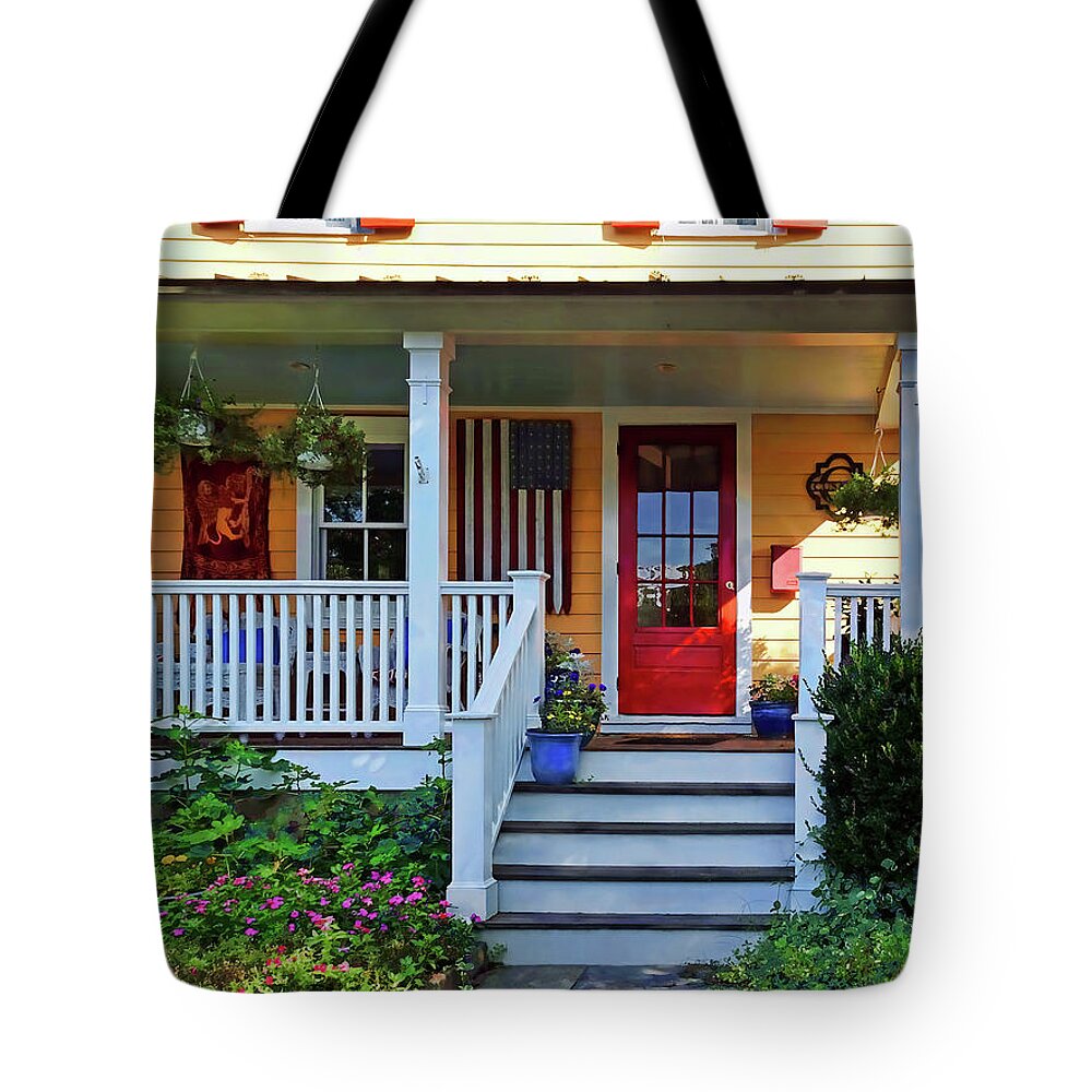 Porch Tote Bag featuring the photograph Mendham NJ - Porch With Wooden American Flag by Susan Savad
