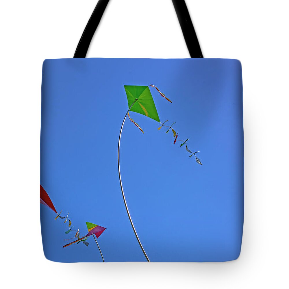 Kites Tote Bag featuring the photograph Metal Kites Blue Sky by Dart Humeston