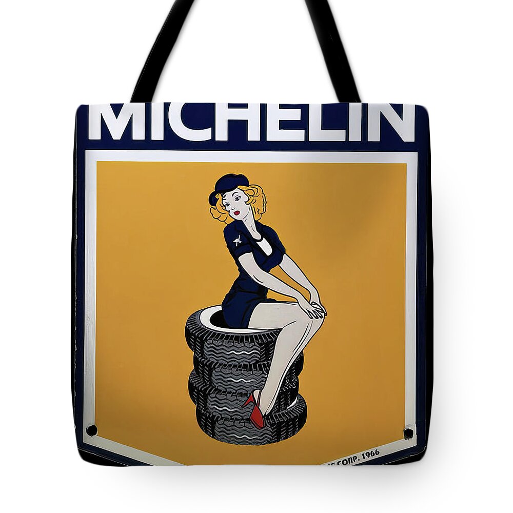 Michelin Tote Bag featuring the photograph Michelin Vintage sign by Flees Photos
