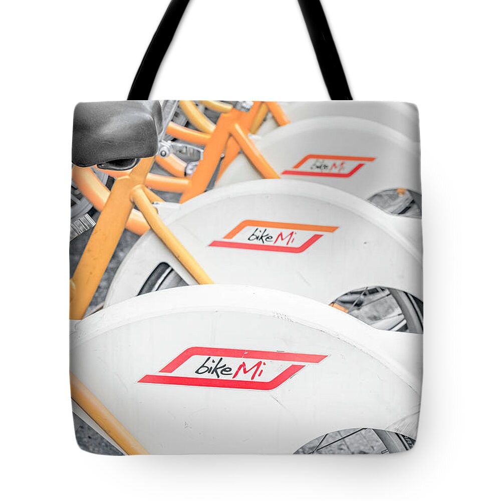 Milan Tote Bag featuring the photograph Milan Italy Bike Sharing by Joan Carroll