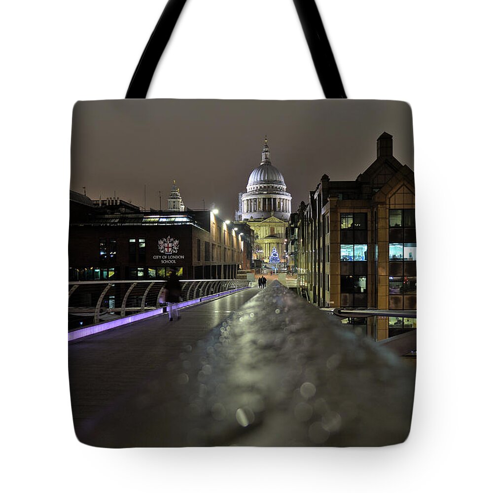 Millennium Bridge Tote Bag featuring the photograph Millennium bridge and St Pauls Cathedral view in London by Angelo DeVal