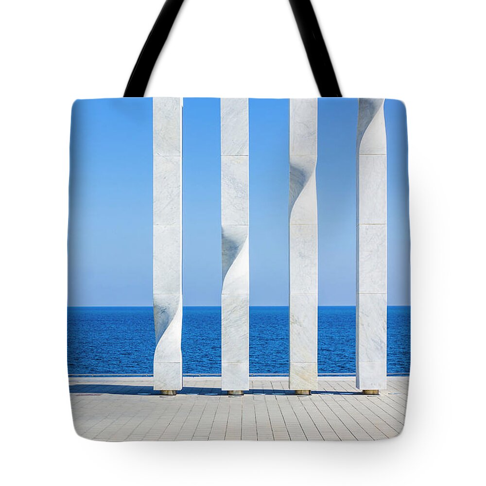 Four Posts Tote Bag featuring the photograph Modern art sculpture, Barcelona by Neale And Judith Clark