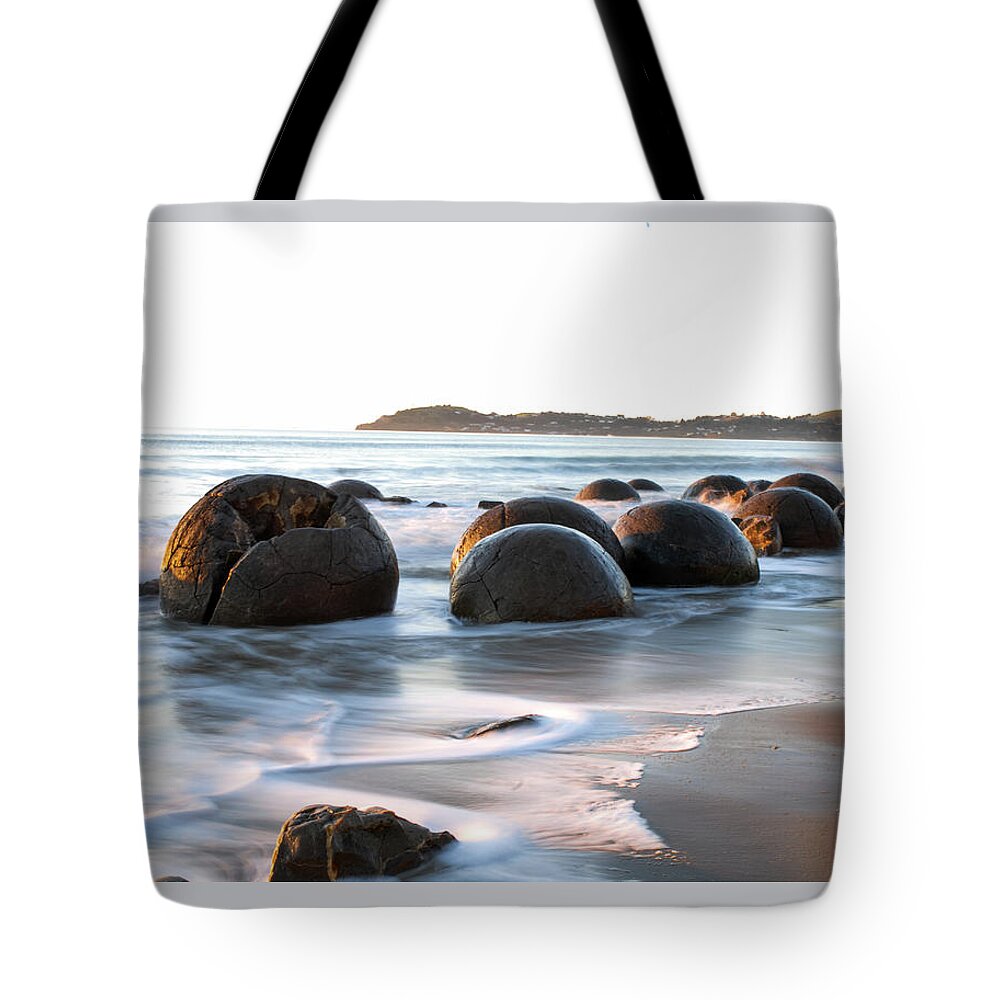 Moeraki Tote Bag featuring the photograph Tranquility - Moeraki Boulders, South Island. New Zealand by Earth And Spirit
