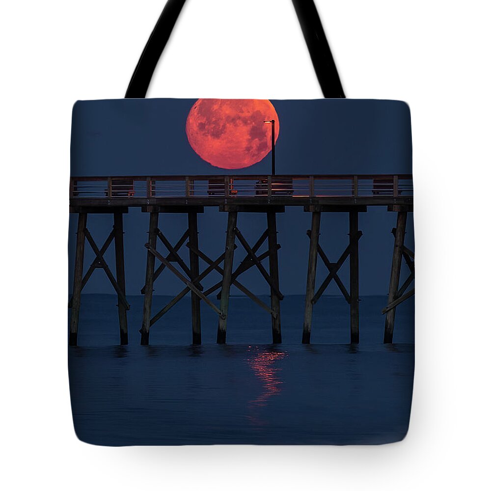 Fullmoon Tote Bag featuring the photograph Moonset by Nick Noble
