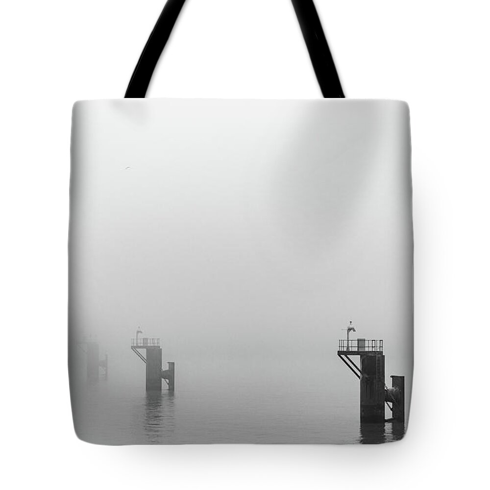 Mooring Tote Bag featuring the photograph Mooring Dolphins in the Fog by Gavin Lewis
