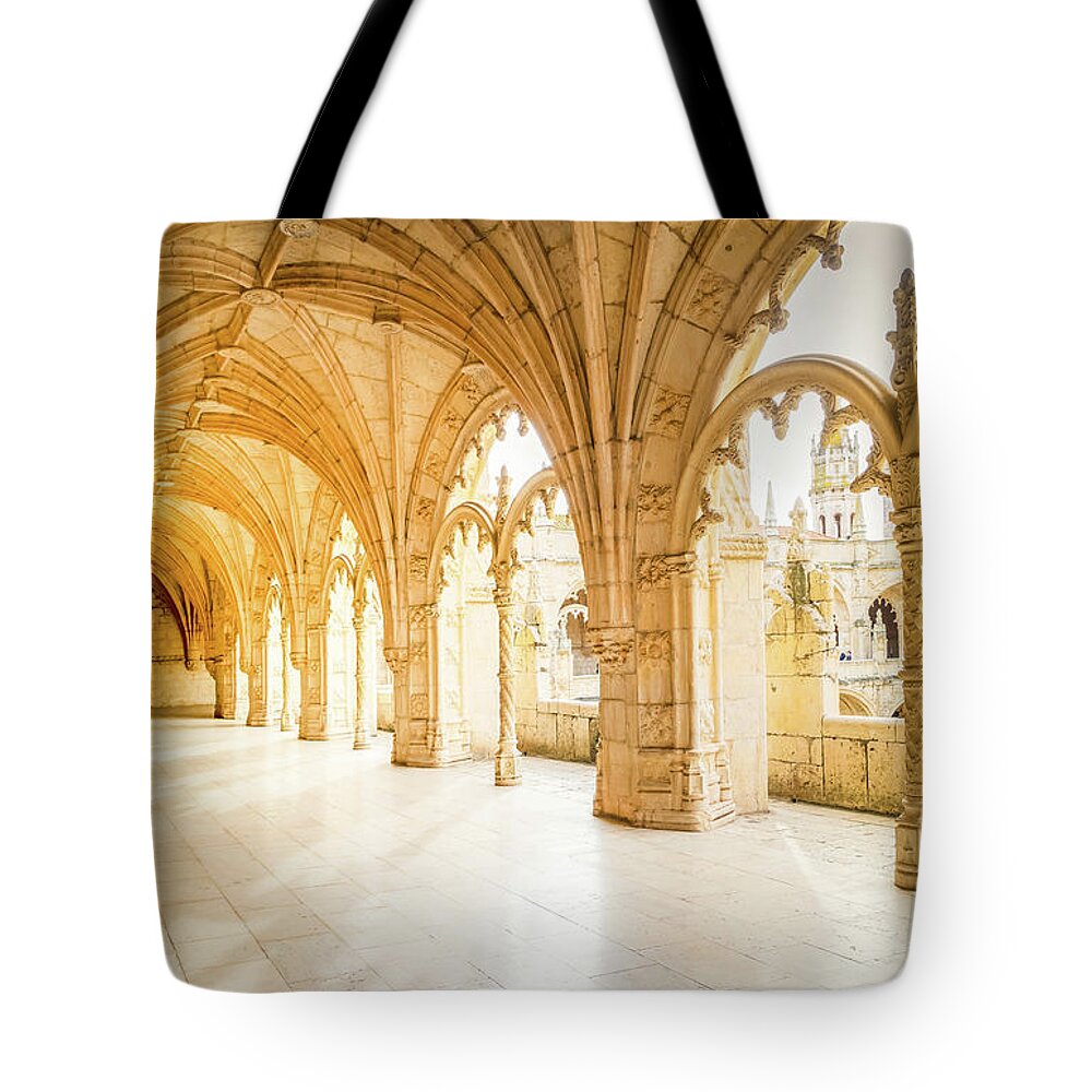 Jeronimos Tote Bag featuring the photograph Mosteiro dos Jeronimos in Lisbon, Portugal by Anastasy Yarmolovich