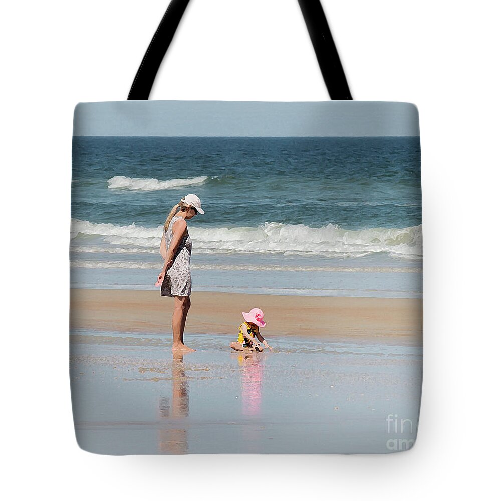 Beach Tote Bag featuring the photograph Mother and Child Beach Moment by Neala McCarten
