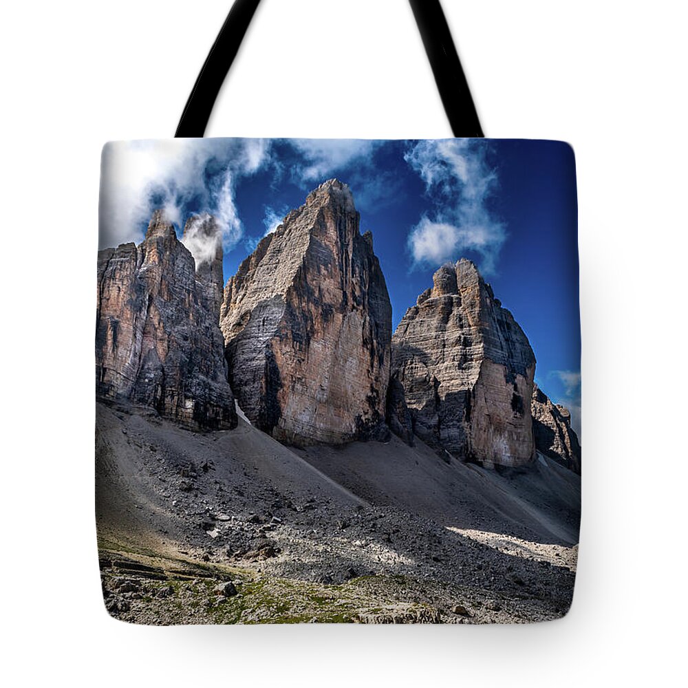 Alpine Tote Bag featuring the photograph Mountain Formation Tre Cime Di Lavaredo In The Dolomites Of South Tirol In Italy by Andreas Berthold