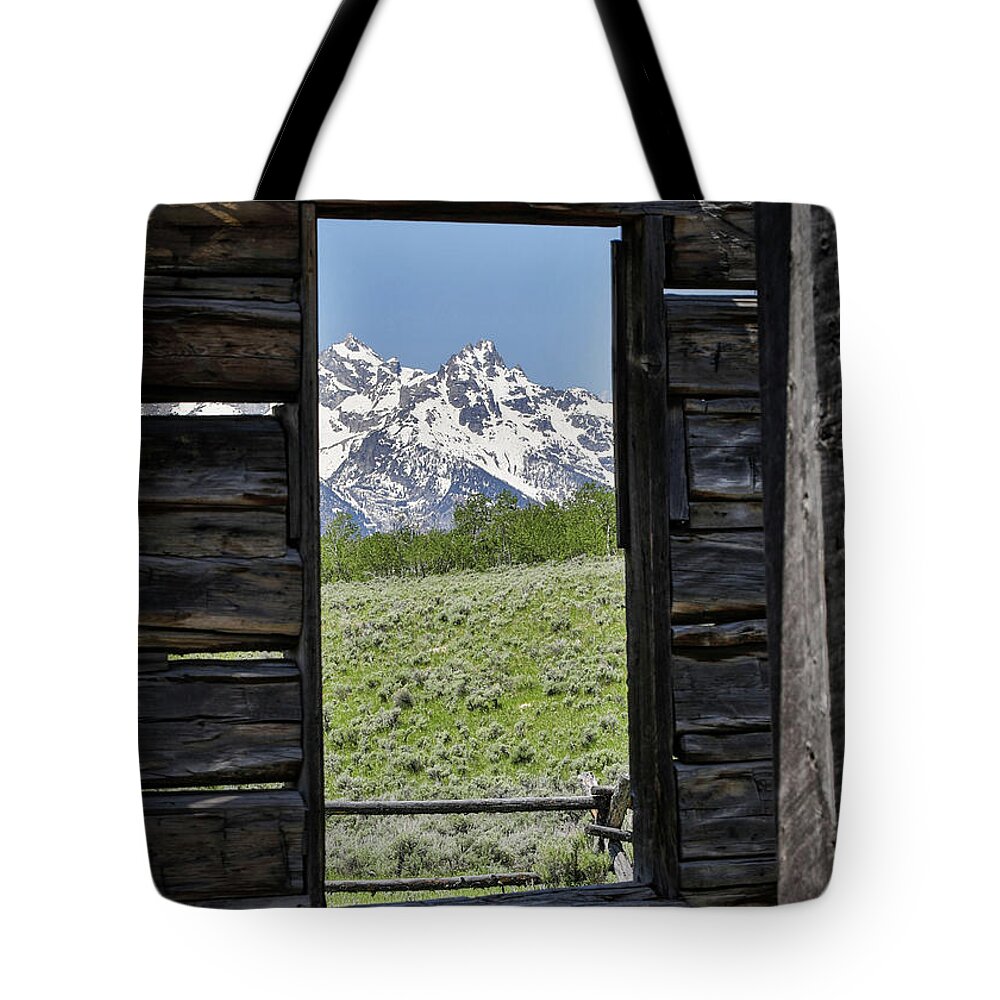 Barn Window Mountain View Tote Bag featuring the photograph Mountains Through Cabin Window by Dan Sproul
