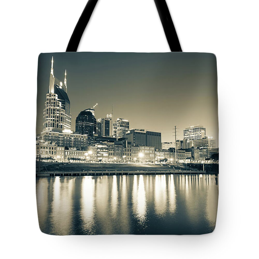 Nashville Skyline Tote Bag featuring the photograph Nashville Tennessee City Skyline At Dusk - Sepia Monochrome by Gregory Ballos