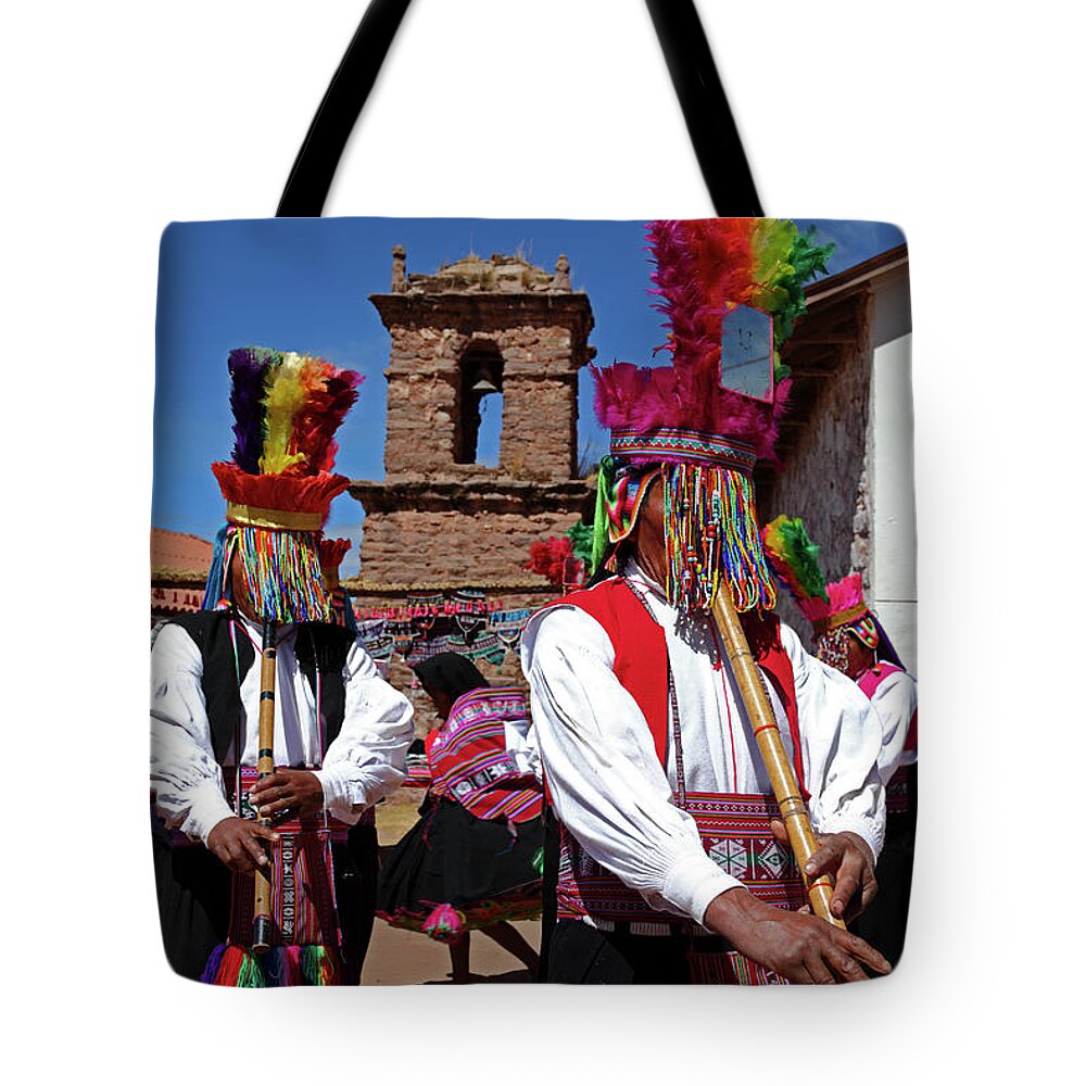 Peru Tote Bag featuring the photograph Native musicians playing pinkillos Taquile Island Peru by James Brunker