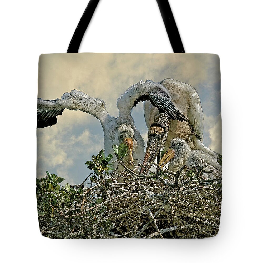 Wood Storks Tote Bag featuring the digital art Nesting Wood Storks Cps by Larry Linton