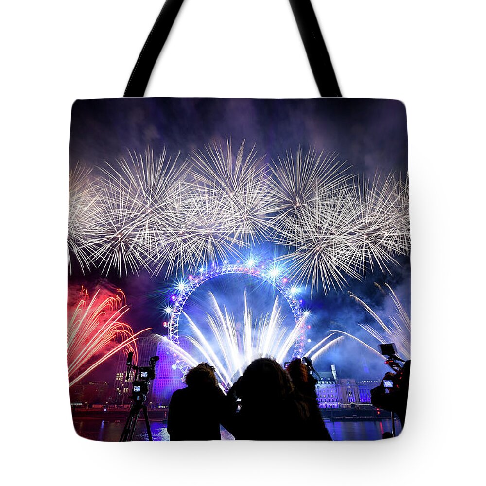 Fireworks Tote Bag featuring the photograph New Years Eve Fireworks by Andrew Lalchan