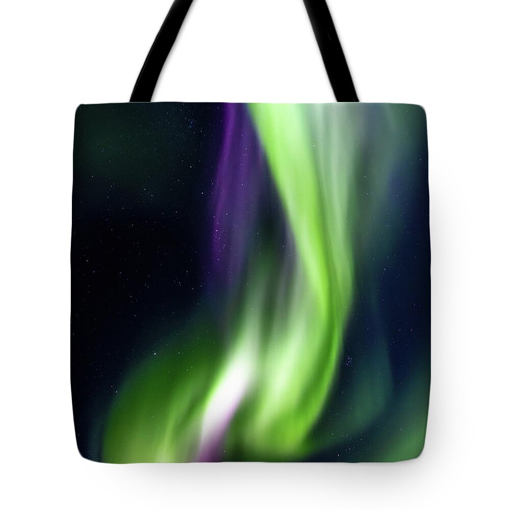 Iceland Tote Bag featuring the photograph Northern lights, Aurora Borealis in the night sky, Iceland. by Jane Rix