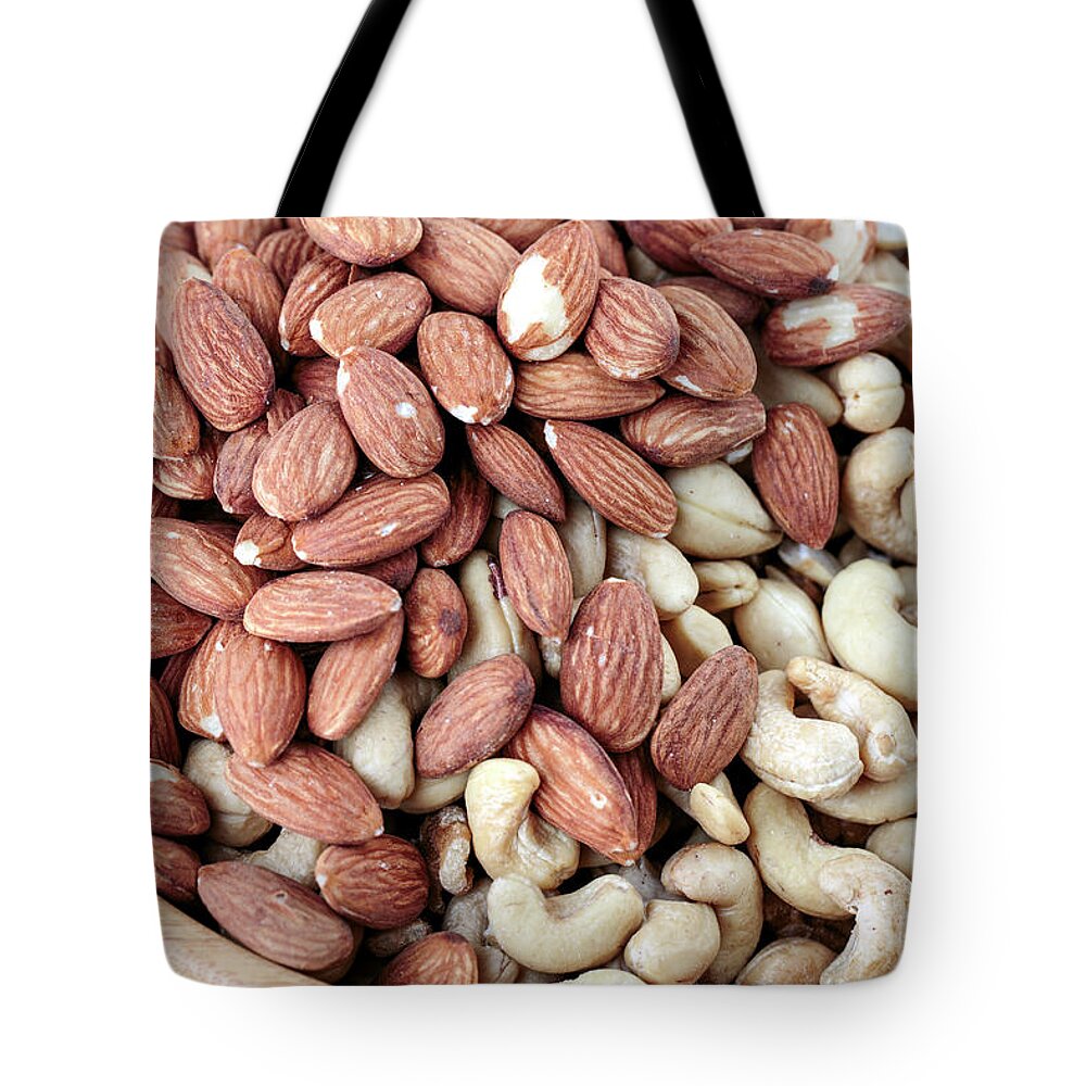 Nuts Tote Bag featuring the photograph Nuts by Nailia Schwarz