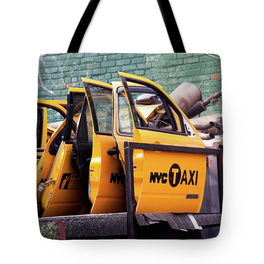 Nyc Tote Bag featuring the photograph NYC Taxi Shop by Chris Goldberg