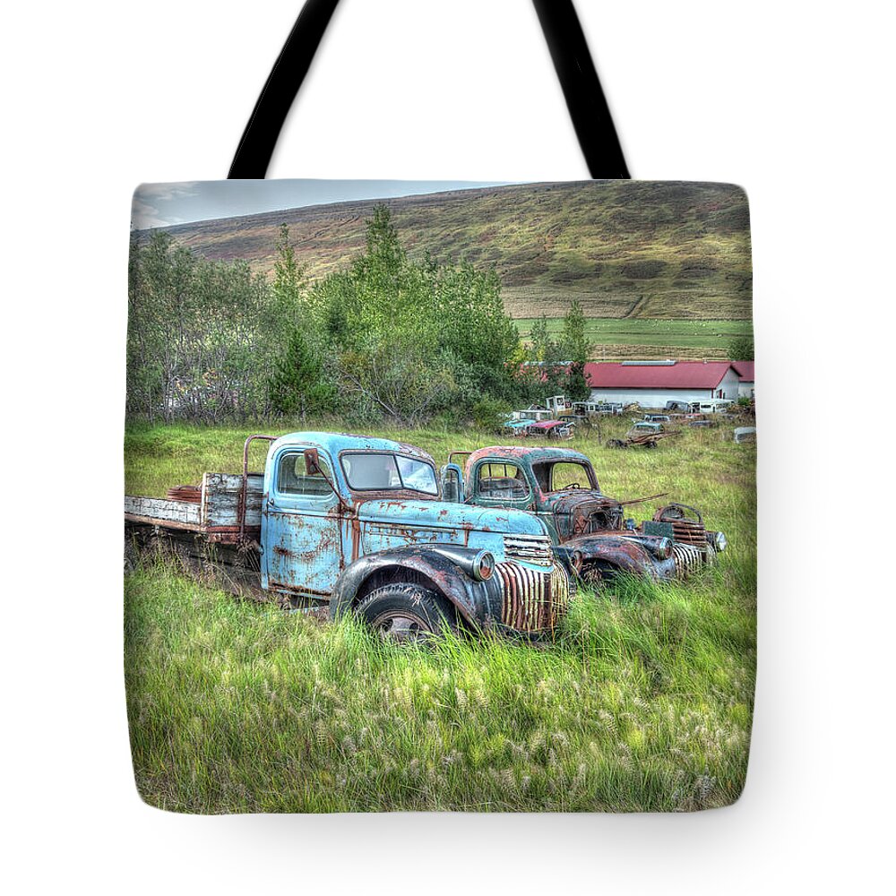 Ford Chevy Tote Bag featuring the photograph Old Chevys at Ystafell Museum Iceland by Kristia Adams