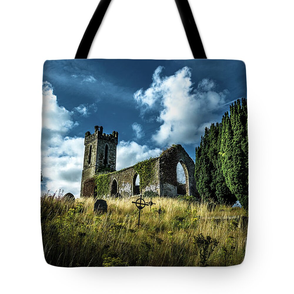 Ireland Tote Bag featuring the photograph Old Church Ruin with Graveyard in Ireland by Andreas Berthold