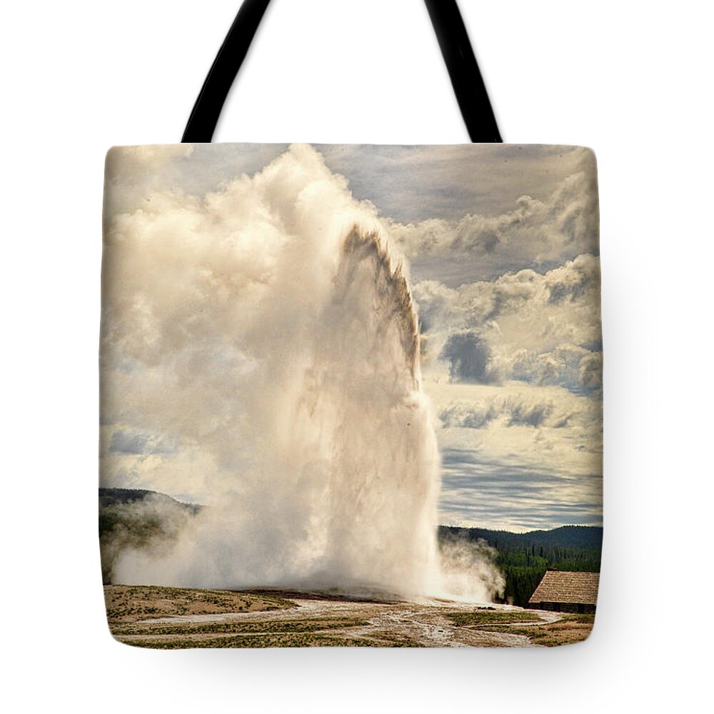  Yellow Stone National Park Tote Bag featuring the photograph Old Faithful Eruption by Joe Granita