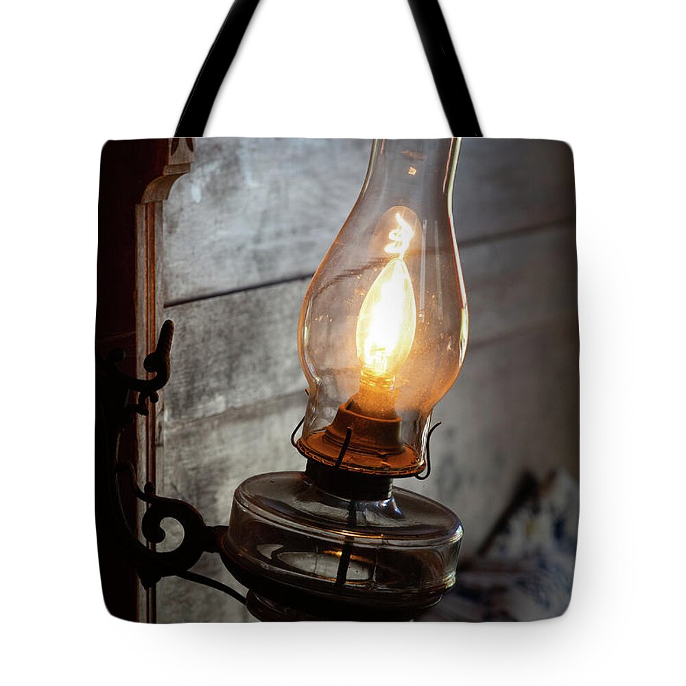 Light Tote Bag featuring the photograph Old Lantern by Katie Dobies
