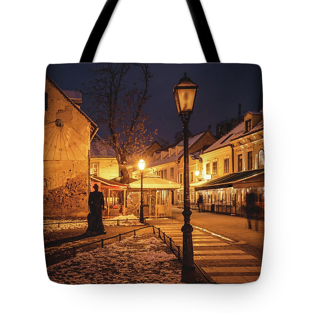 Zagreb Tote Bag featuring the photograph Old Tkalca street in Zagreb evening advent view by Brch Photography