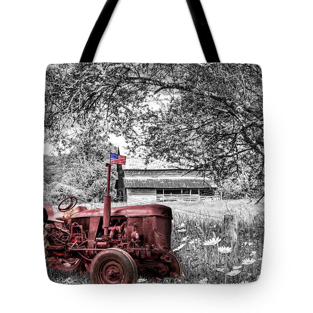 Black Tote Bag featuring the photograph Old Tractor in the Wildflowers Black and White and Red by Debra and Dave Vanderlaan