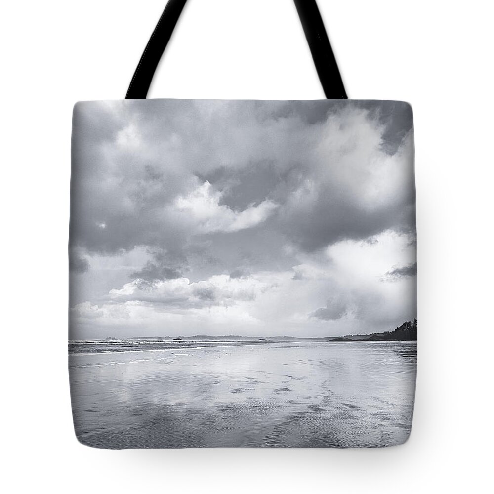 Black And White Photography Tote Bag featuring the photograph On the Tideline Black and White by Allan Van Gasbeck