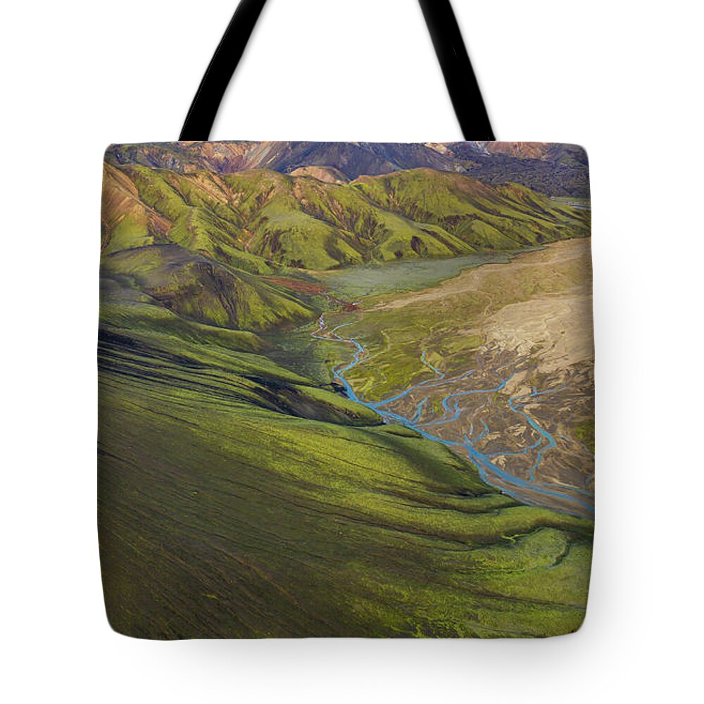 Iceland Tote Bag featuring the photograph Over Iceland Slopes of the Rhyolite Highlands by Mike Reid