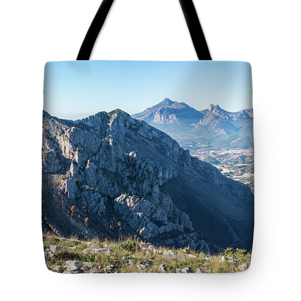 Mountains Tote Bag featuring the photograph Panorama of a blue mountain landscape by Adriana Mueller
