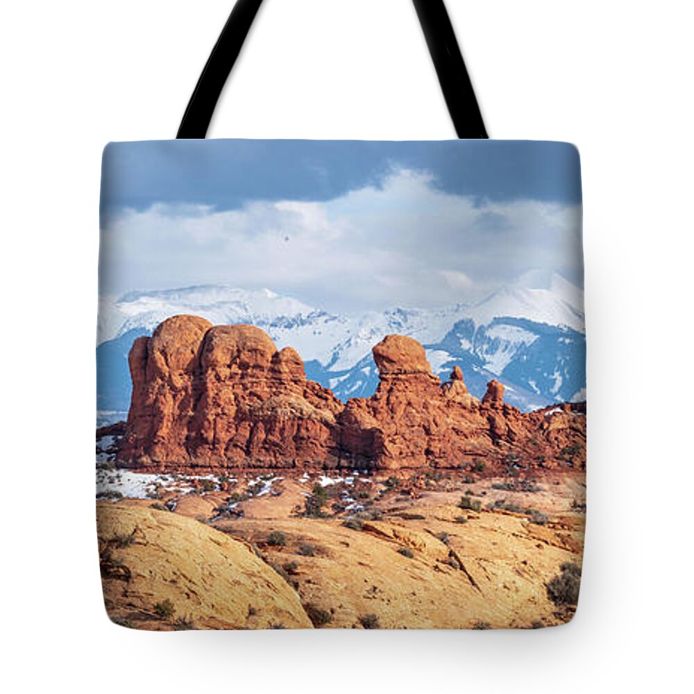 Panorama Tote Bag featuring the photograph Panorama of rock formations in Arches National Park by Robert Miller