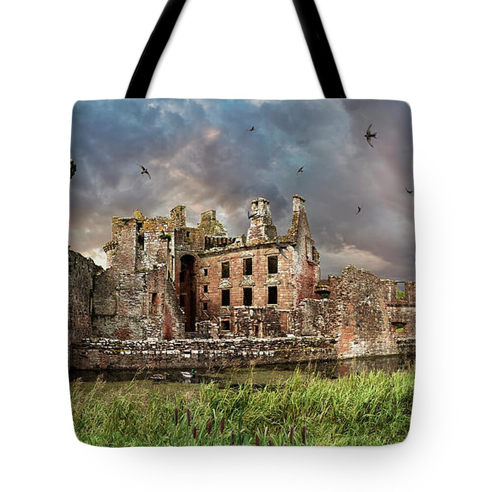 Caerlaverock Castle Tote Bag featuring the photograph Photo of Caerlaverock Castle Scotland, by Paul E Williams