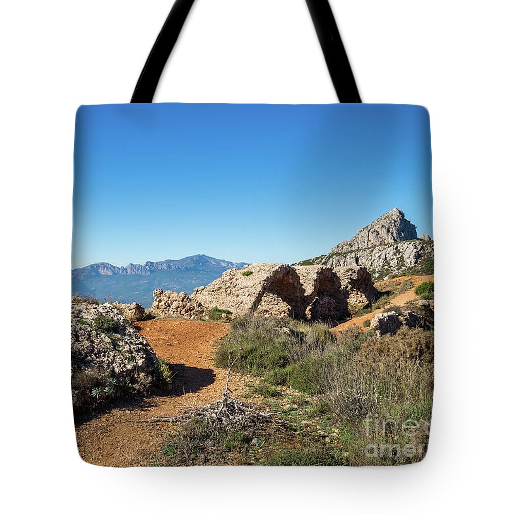 Mountain Landscape Tote Bag featuring the photograph Picturesque ruins of a fortress by Adriana Mueller