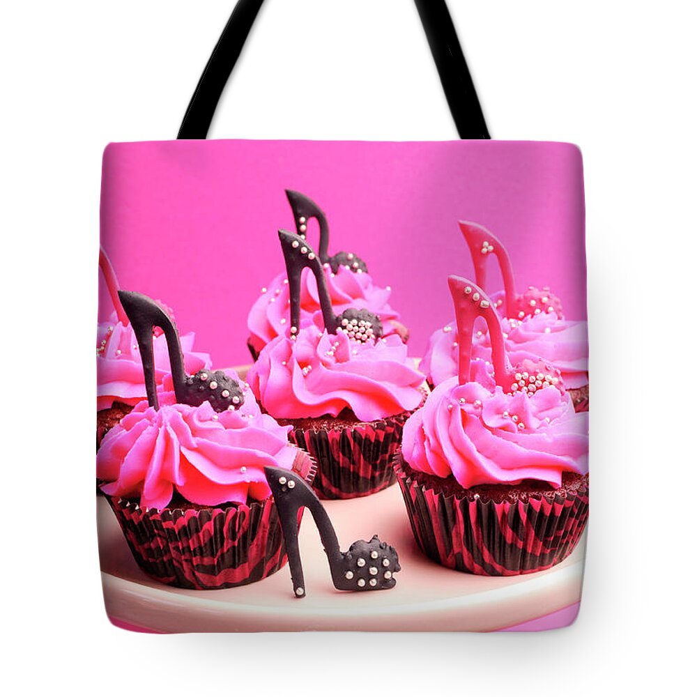 Cupcake Tote Bag featuring the photograph Pink and purple cupcakes by Milleflore Images