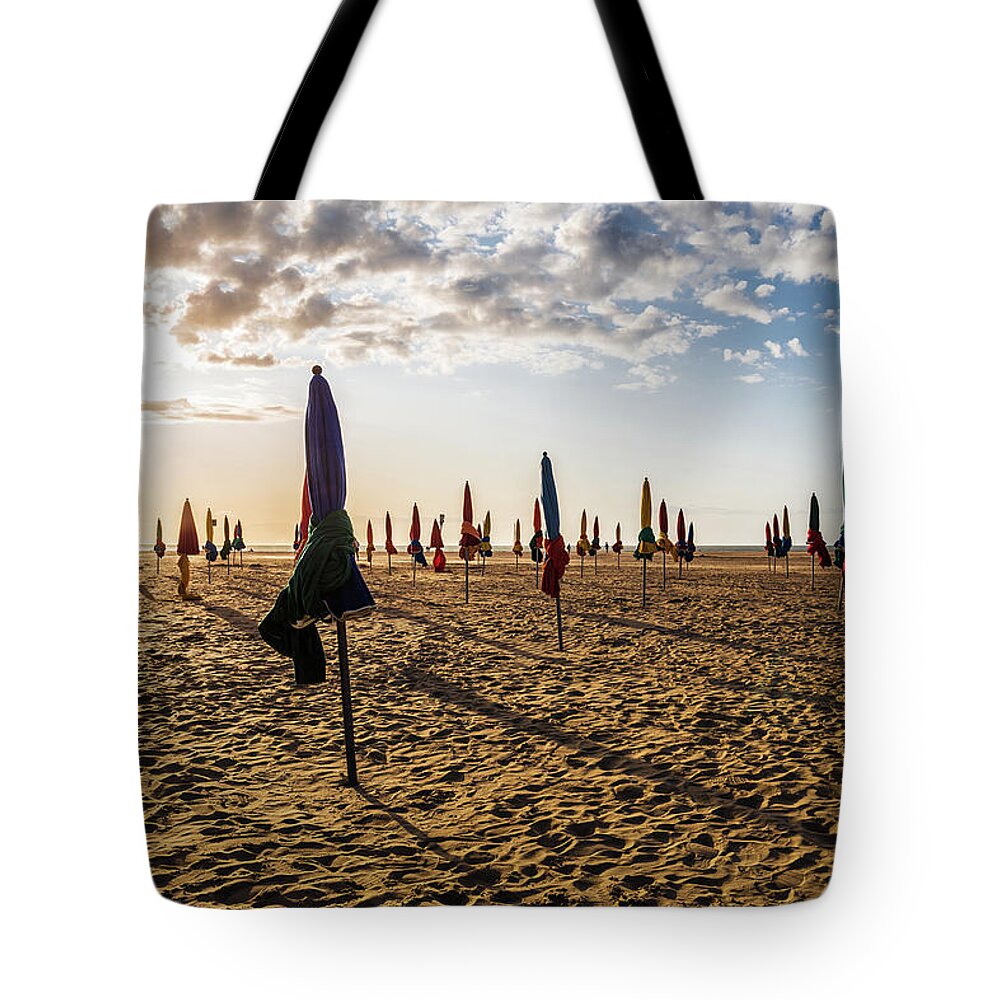 Plage De Deauville Tote Bag featuring the photograph Plage de Deauville at sunset by Fabiano Di Paolo