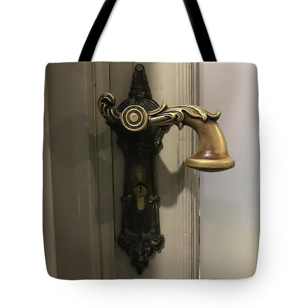  Tote Bag featuring the photograph PoznanReturnfirstdoorknob by Mary Kobet