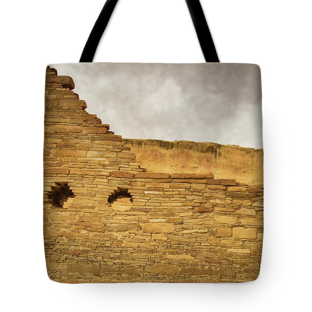 Chaco Canyon Tote Bag featuring the photograph Pueblo Bonito by Kunal Mehra