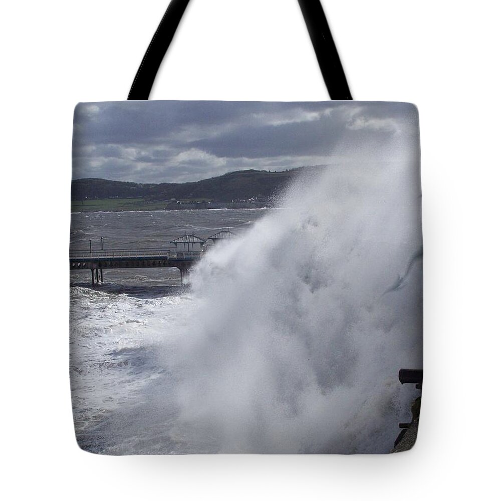 Dragons Tote Bag featuring the photograph Pull up by Christopher Rowlands