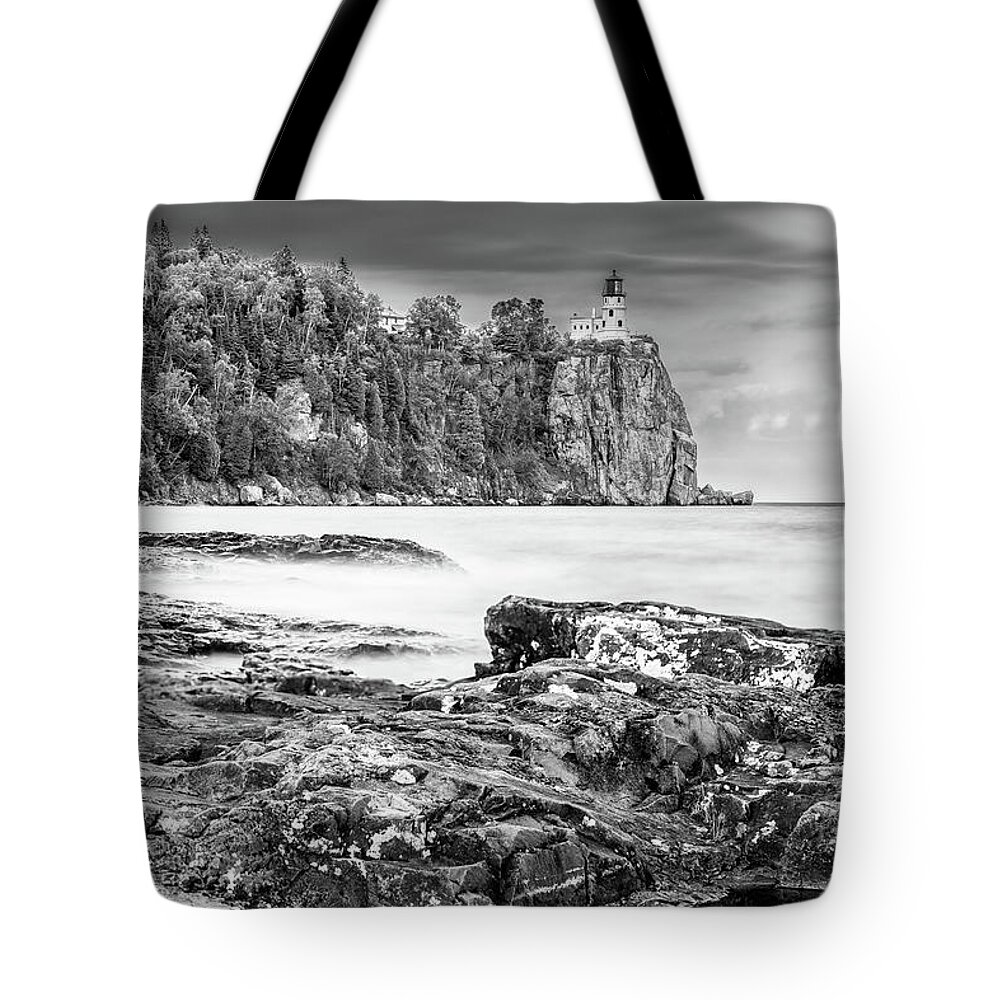 Split Rock Lighthouse Tote Bag featuring the photograph Rain Clouds Over Split Rock Black and White by Sebastian Musial