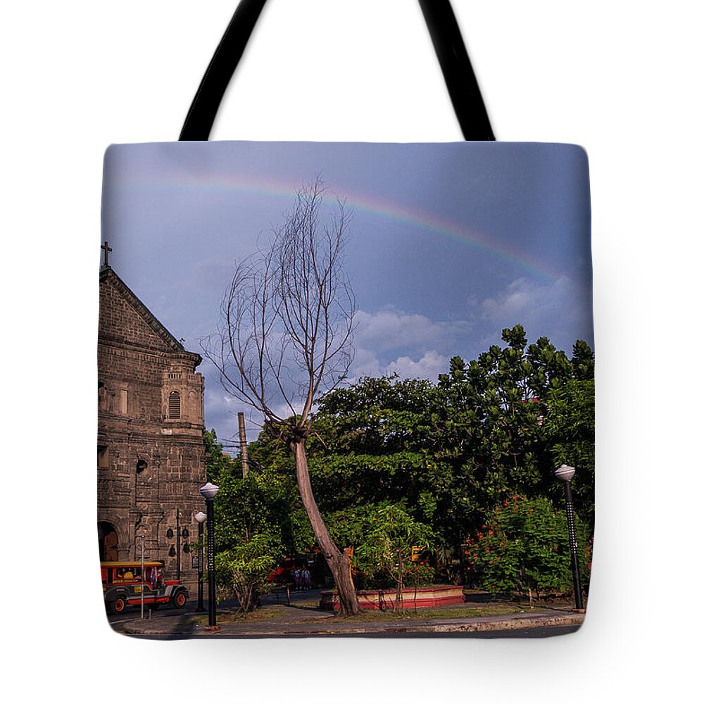 Rainbow Tote Bag featuring the photograph Rainbow over Malate Church by Arj Munoz