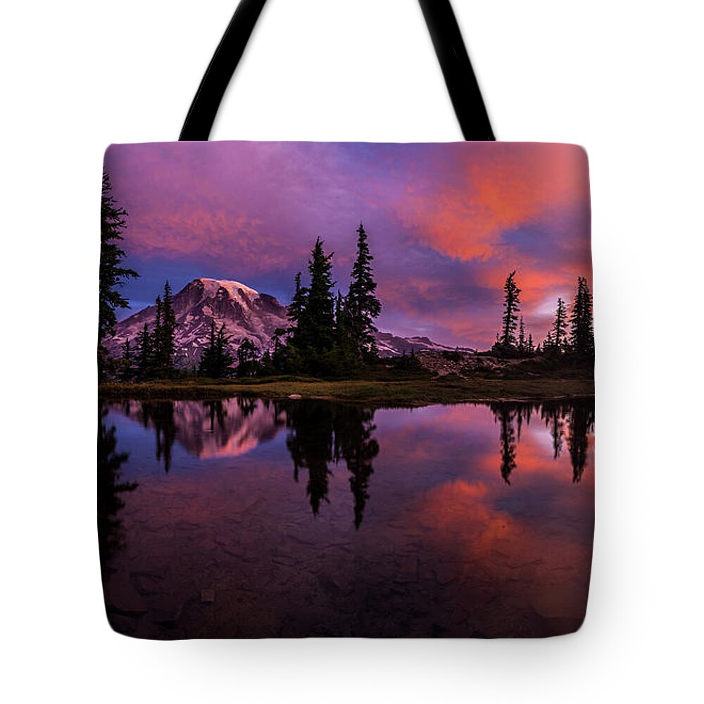 Mount Rainier Tote Bag featuring the photograph Rainier Soaring Sunrise Reflection by Mike Reid