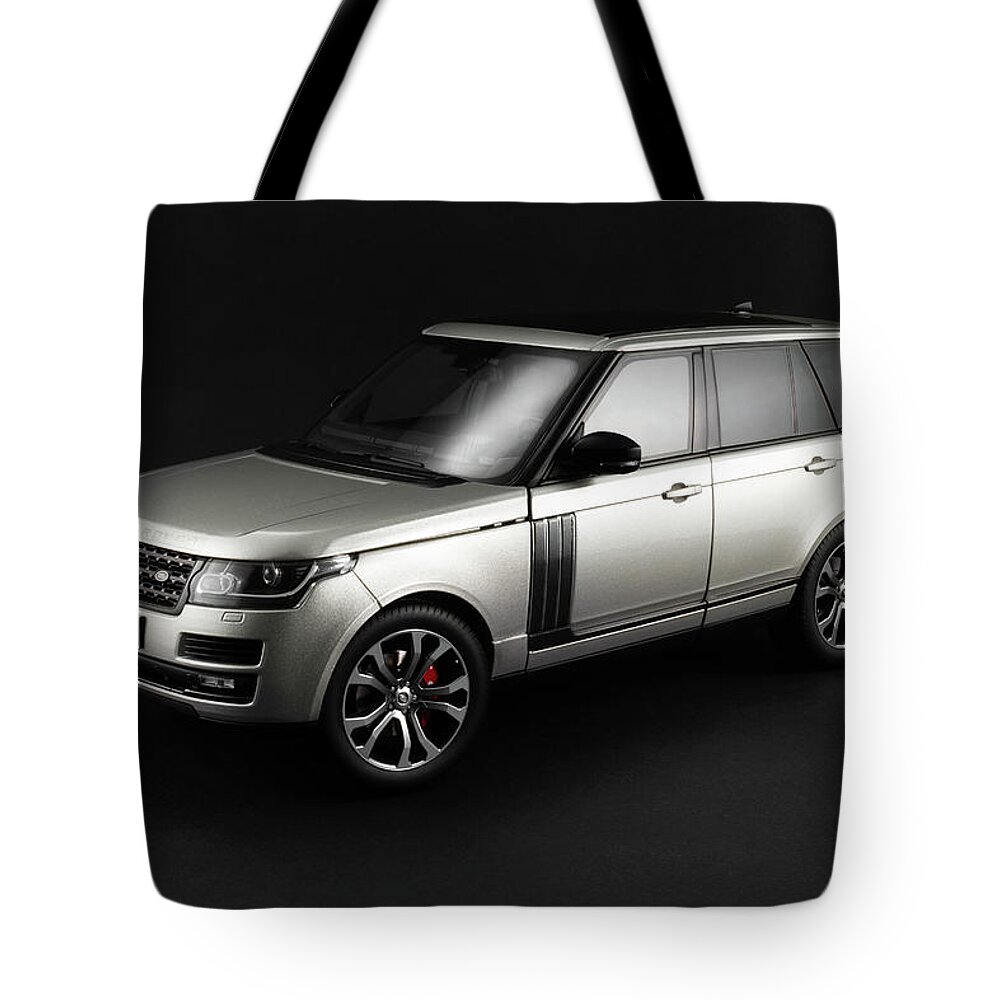 Range Rover Tote Bag featuring the photograph Range Rover SVAutobiography by Evgeny Rivkin