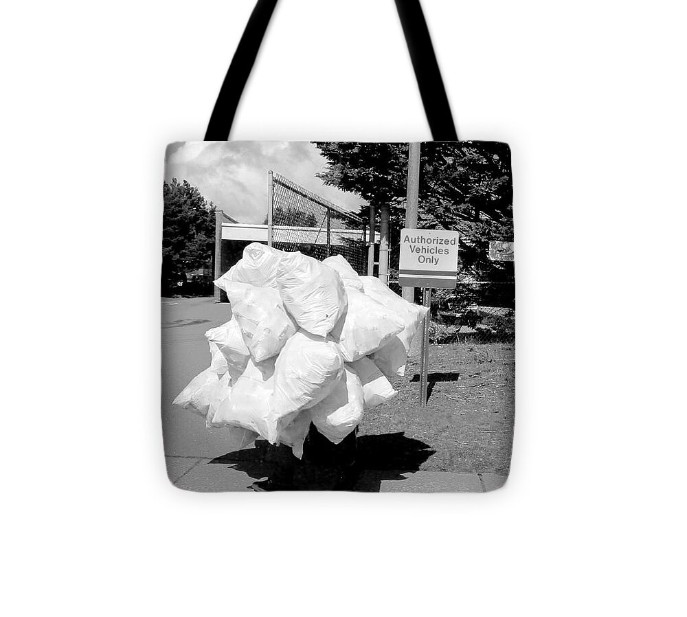 Recycling Tote Bag featuring the photograph Re-Cycling by Marie Neder