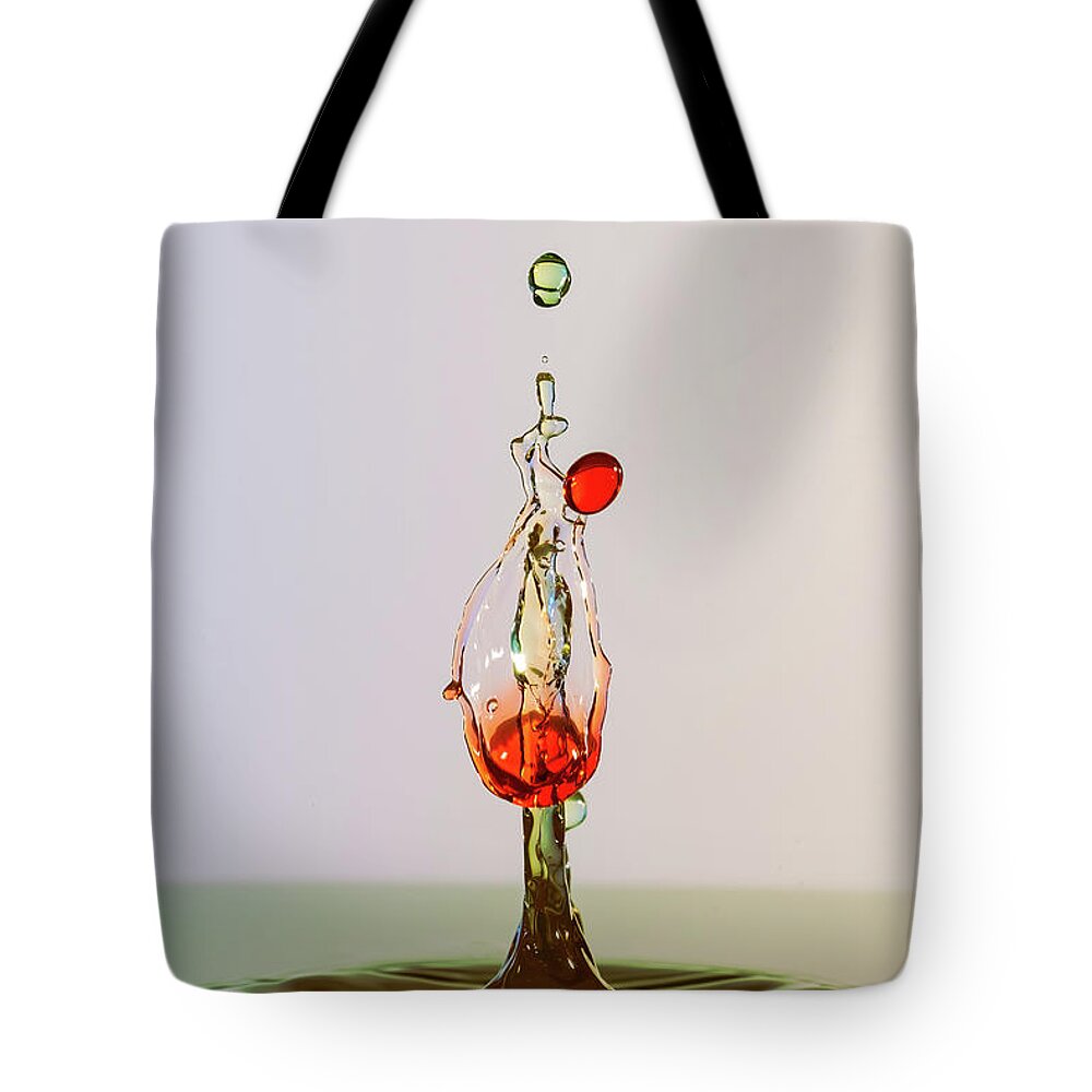 Abstract Tote Bag featuring the photograph Red and Green by Sue Leonard