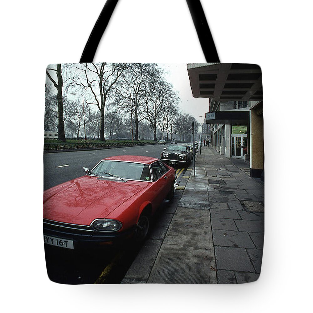 Jaguar Tote Bag featuring the photograph Red Jaguar by Jim Mathis