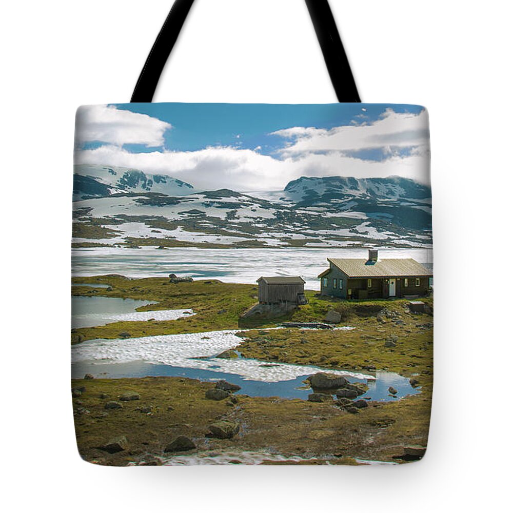 Blue Sky Tote Bag featuring the photograph Remote Cabin in Norway by Matthew DeGrushe