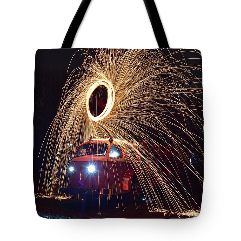 Red Tote Bag featuring the photograph Ring of Fire by Christina McGoran