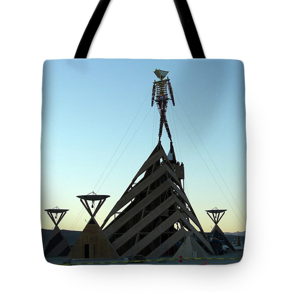 Black Tote Bag featuring the photograph Rites Of Passage by Carl Moore
