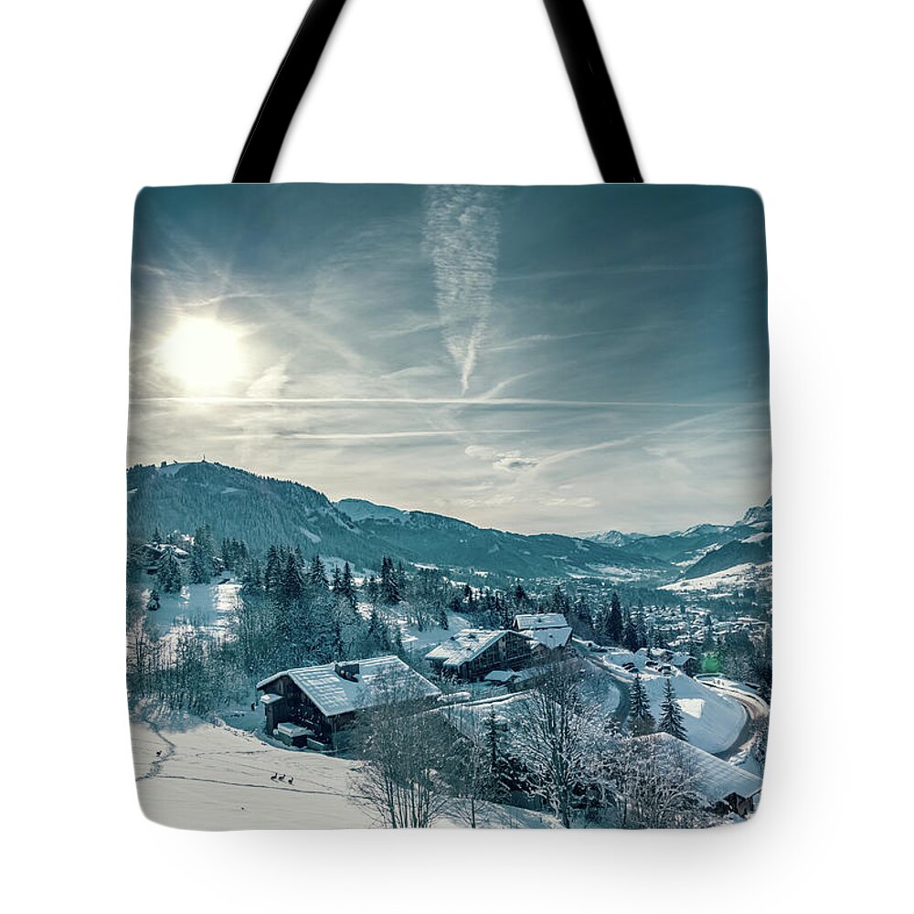 Geneva Tote Bag featuring the photograph Roe Deers running in the snow in Megeve by Benoit Bruchez